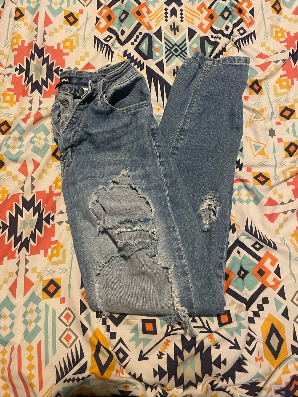 Fashion Nova Light Blue Distressed Skinny Jeans